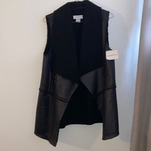 Black sleeveless jacket